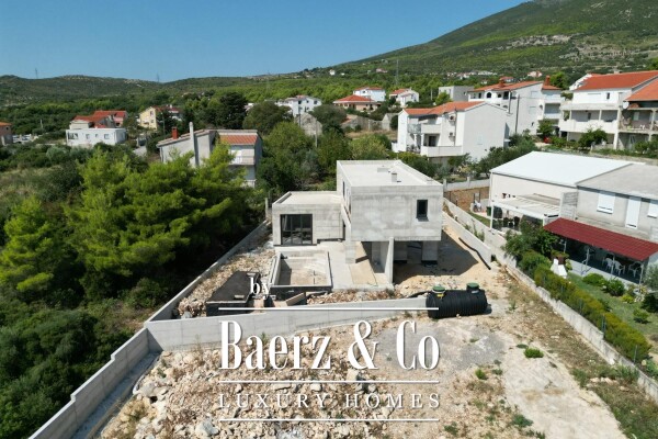 photo 25 Kaštel Novi, modern villa under construction with pool and sea view.