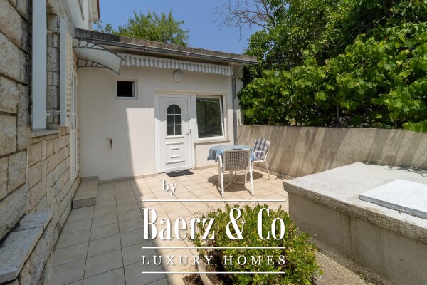 photo 12 Krk, house with three residential units and a large garden in the center