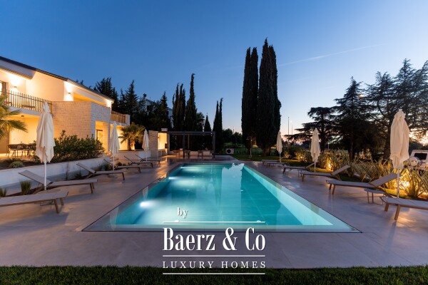 photo 1 Modern Villa with Three Residential Units, Heated Pool and Sea View